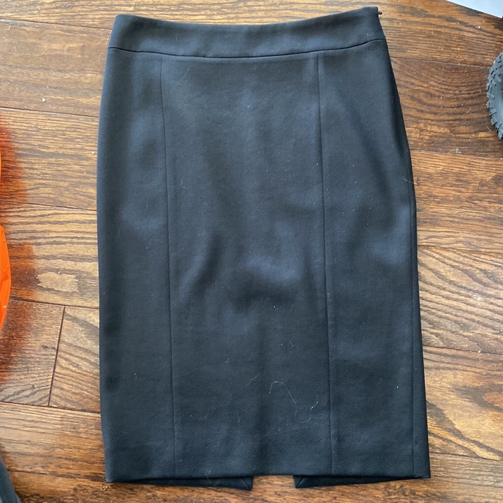 Joseph, black color skirt, preowned, size 36, not noticeable tear